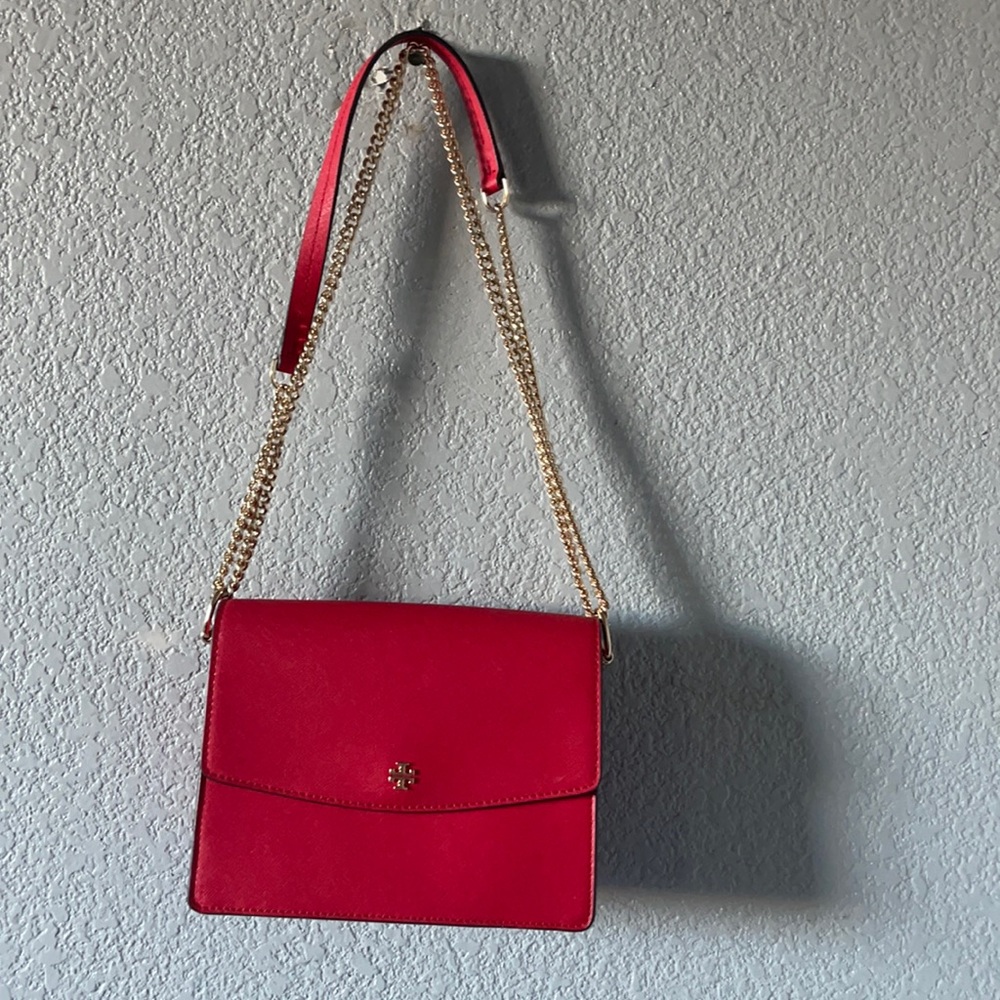 Small Tory Burch body cross purse worn twice still in amazing condition